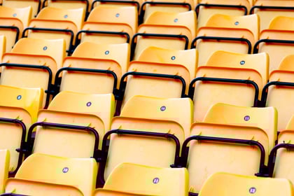 yellow-plastic-seats-at-stadium-2023-11-27-05-11-22-utc